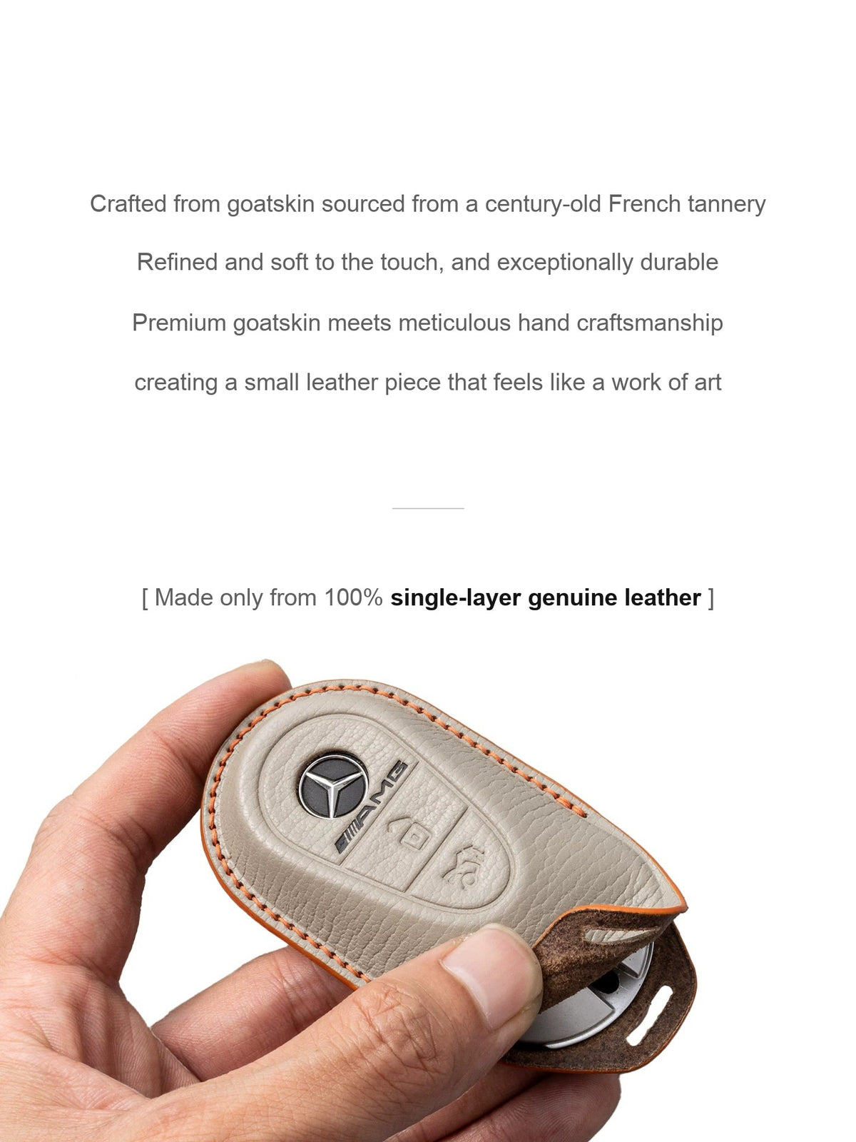 Hand-stitched goatskin leather Mercedes-Benz key case held in hand