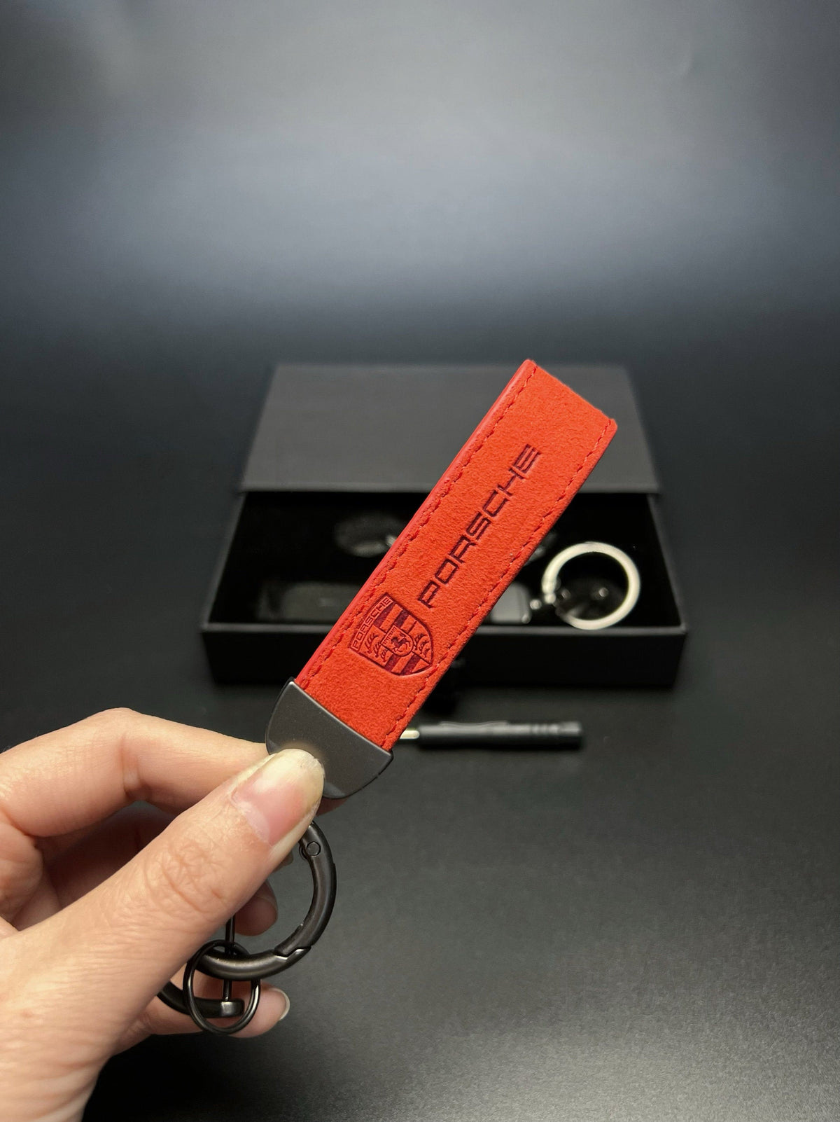 Porsche red suede key strap with metal key ring