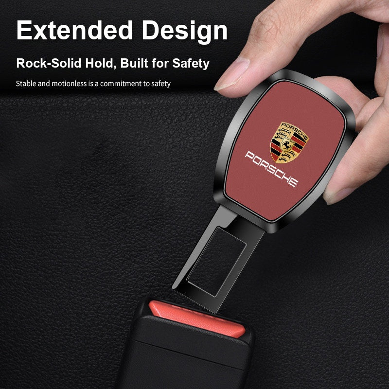 Porsche seat belt extender being inserted into the buckle