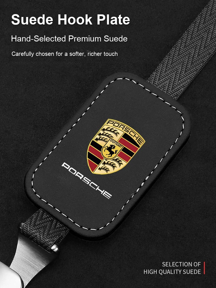 Porsche suede hook plate close-up with crest
