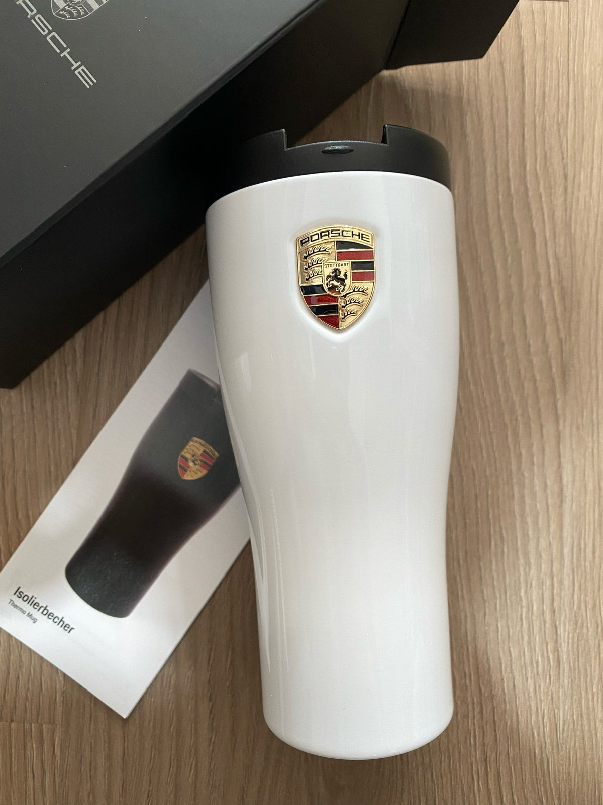 Porsche thermo mug crest close-up