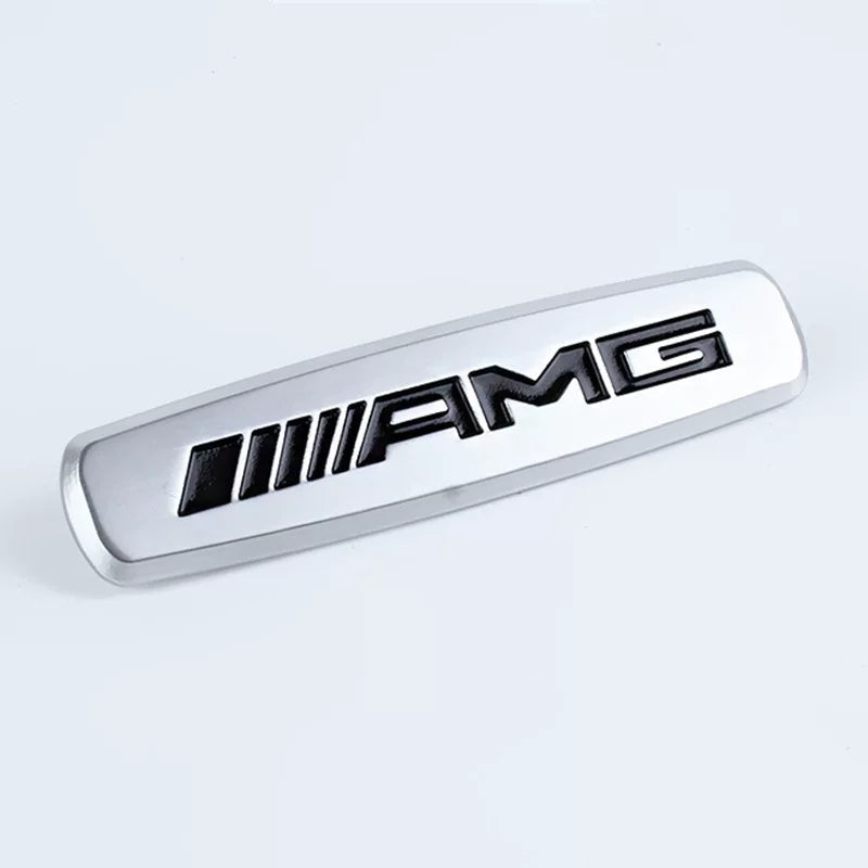 Brushed metal AMG seat emblem close-up